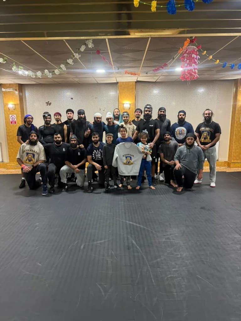 Devanhaar wrestlers gathered for an academy group photograph