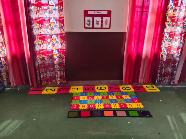 A colourful learning space with alphabet and number mats